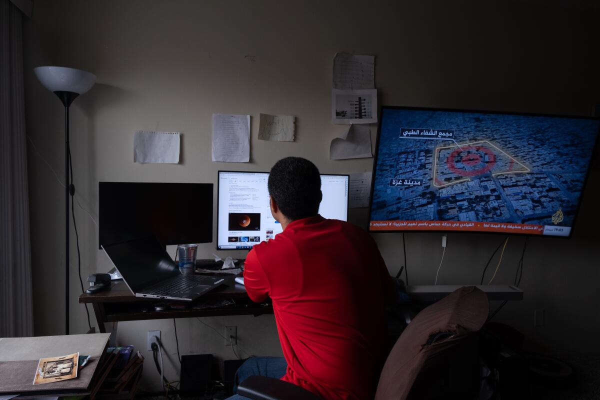 Loay Elbasyouni looks at space images on his computer. 