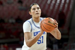 UCLA center Lauren Betts shoots a free throw against Arkansas.