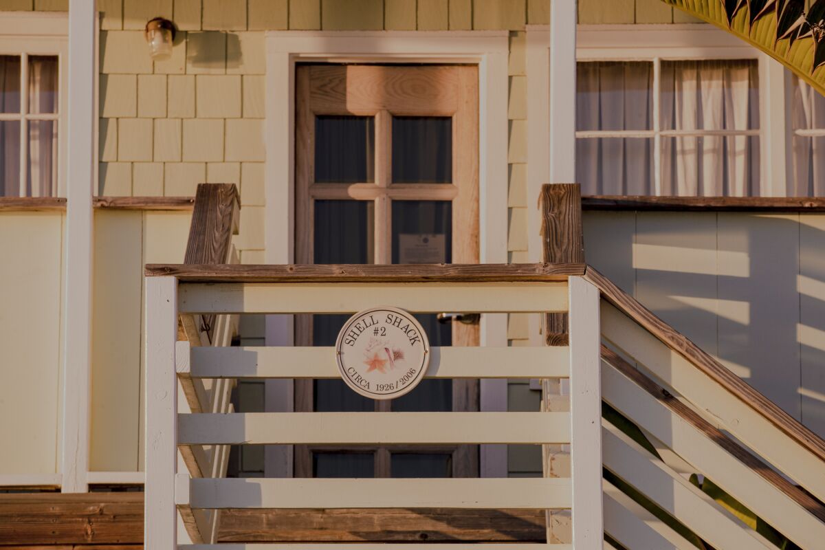 A closeup view of the Shell Shack, a rustic beach cottage.
