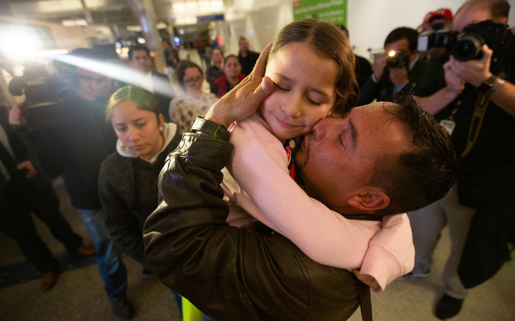 Migrant parents separated from children since 2018 are reunited at LAX -  Los Angeles Times