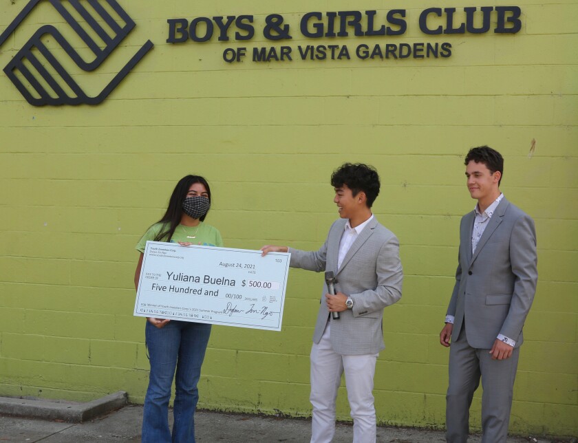 Dylan Jin-Ngo, center, and Gavin Glickman, right, Juliana Buelna, left, at the Boys & Girls Club Mar Vista Gardens