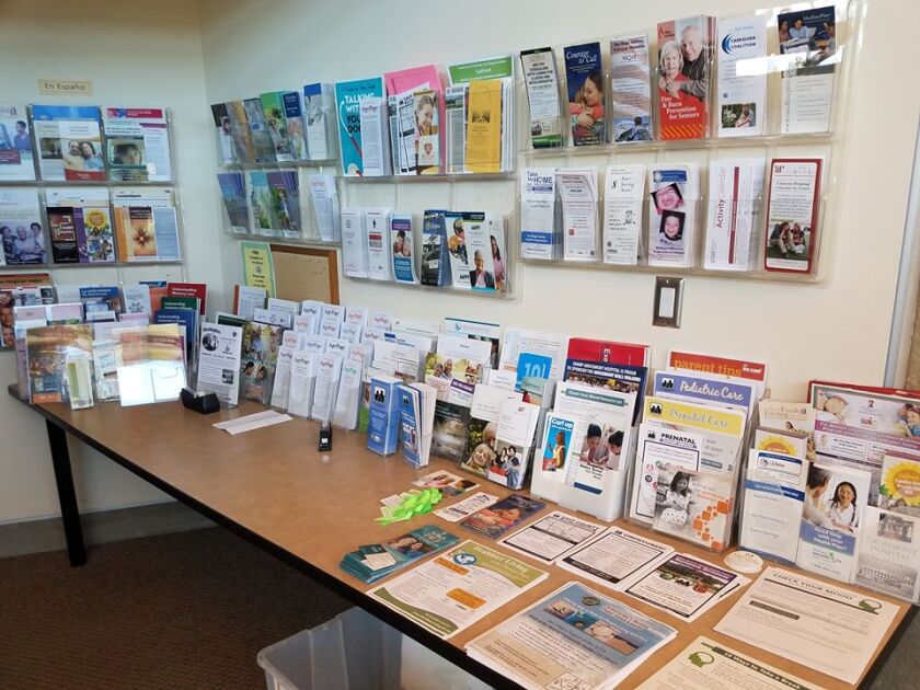 Health-related pamphlets and brochures line a table inside the Grossmont Healthcare District's library. The district will be offering more scholarship money for students this year.