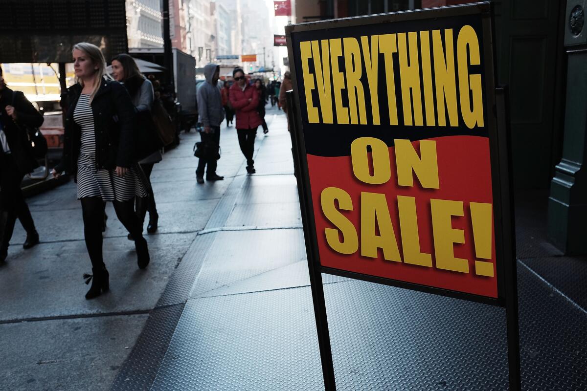 A sign advertises a sale in a shopping district in lower Manhattan on Nov. 17.