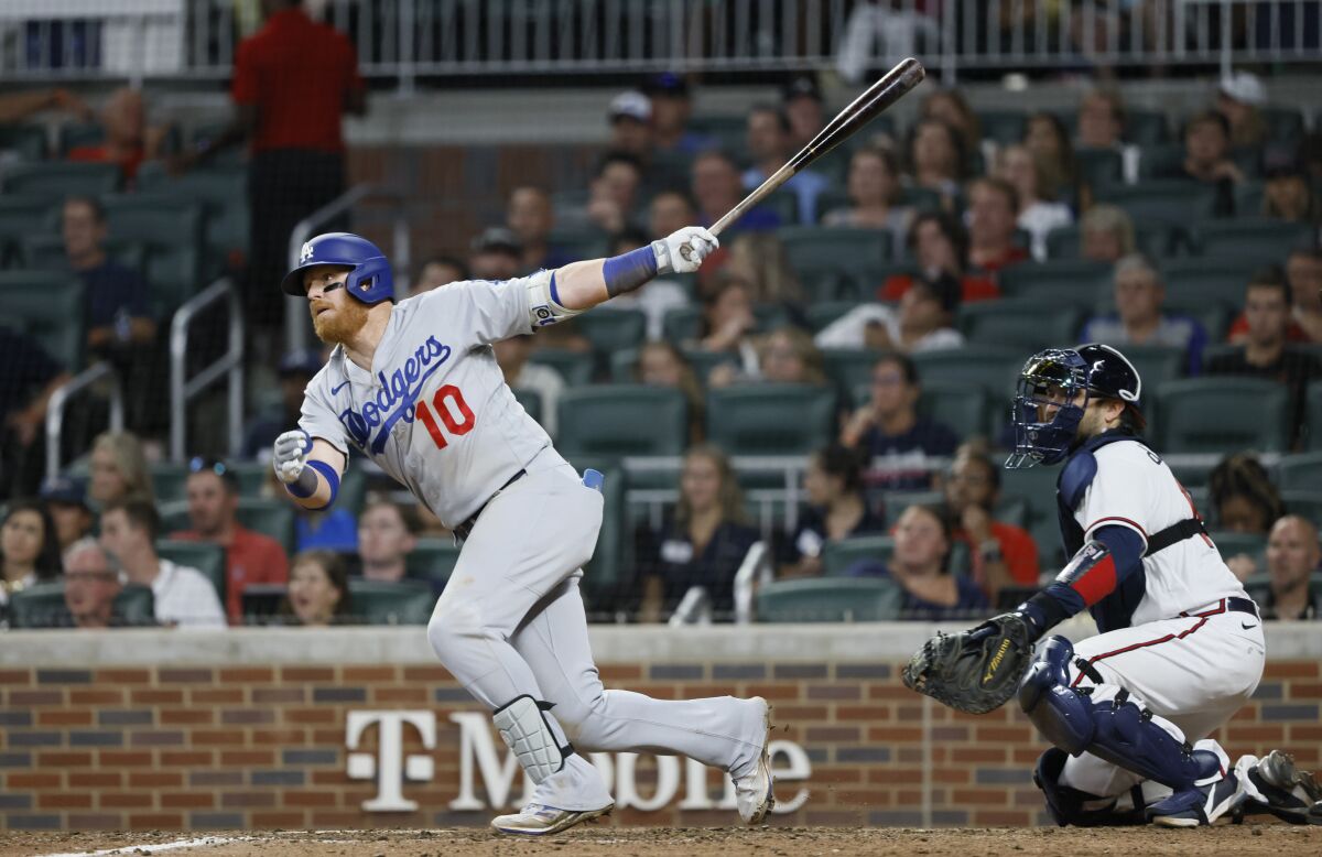 Dodgers third baseman Justin Turner singles against the Braves on June 25 in Atlanta.