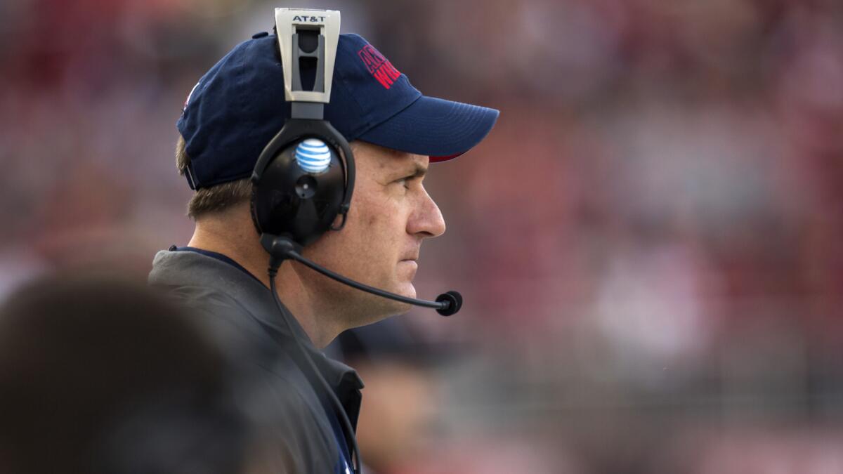 Arizona Coach Rich Rodriguez looks on during a game against Washington State on Oct. 25.