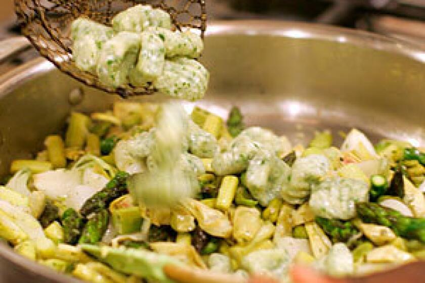 MAIN DISH: Herbed ricotta gnocchi add heft to a spring vegetable stew.