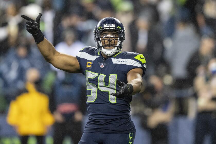 Seattle Seahawks linebacker Bobby Wagner gestures to the crowd during an NFL football game against the New Orleans Saints, Monday, Oct. 25, 2021, in Seattle. The Saints won 13-10. (AP Photo/Stephen Brashear)