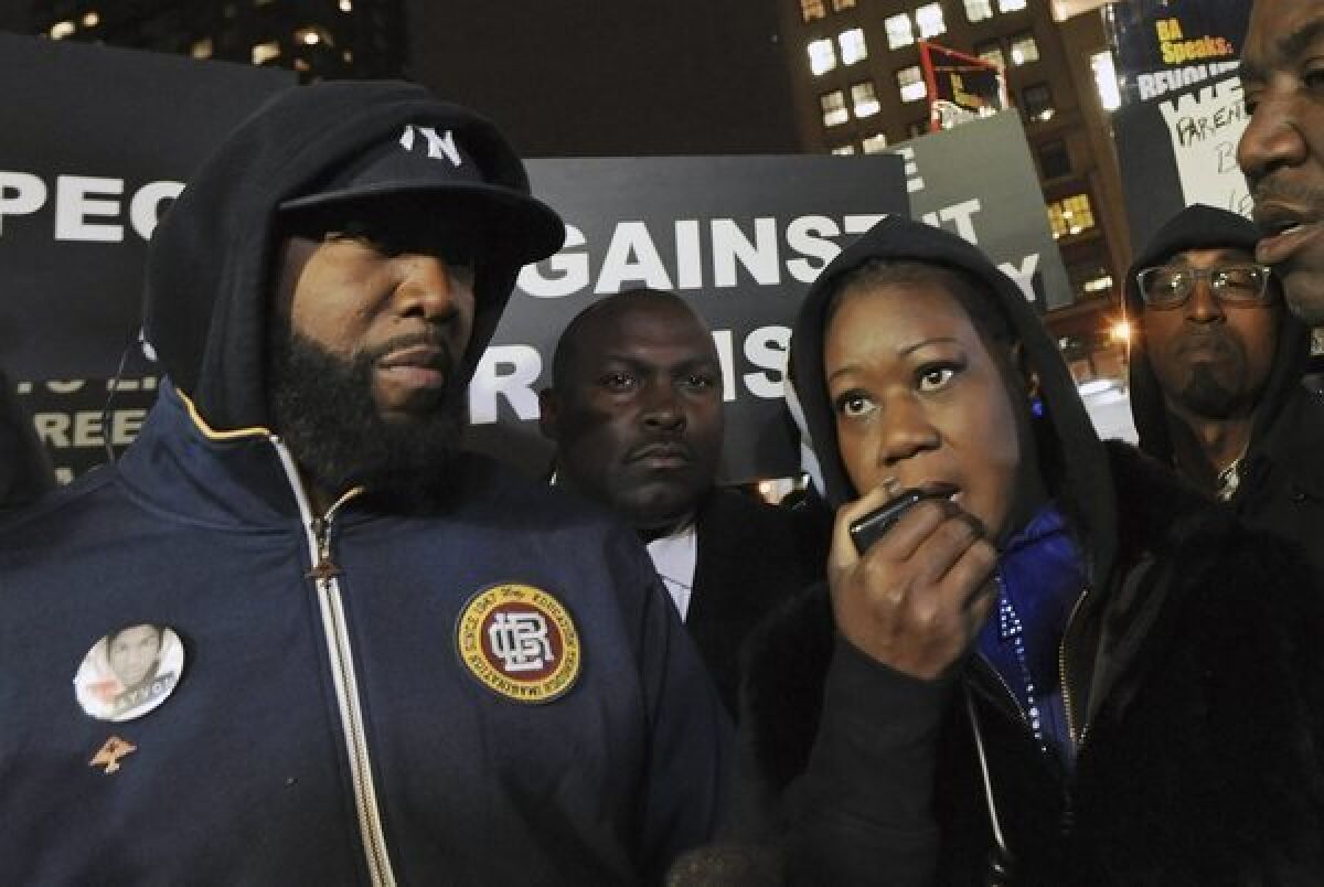 Sybrina Fulton and Tracy Martin, left, the parents of Trayvon Martin, speak at a protest on the anniversary of their son Trayvon's death in Union Square Park in New York.