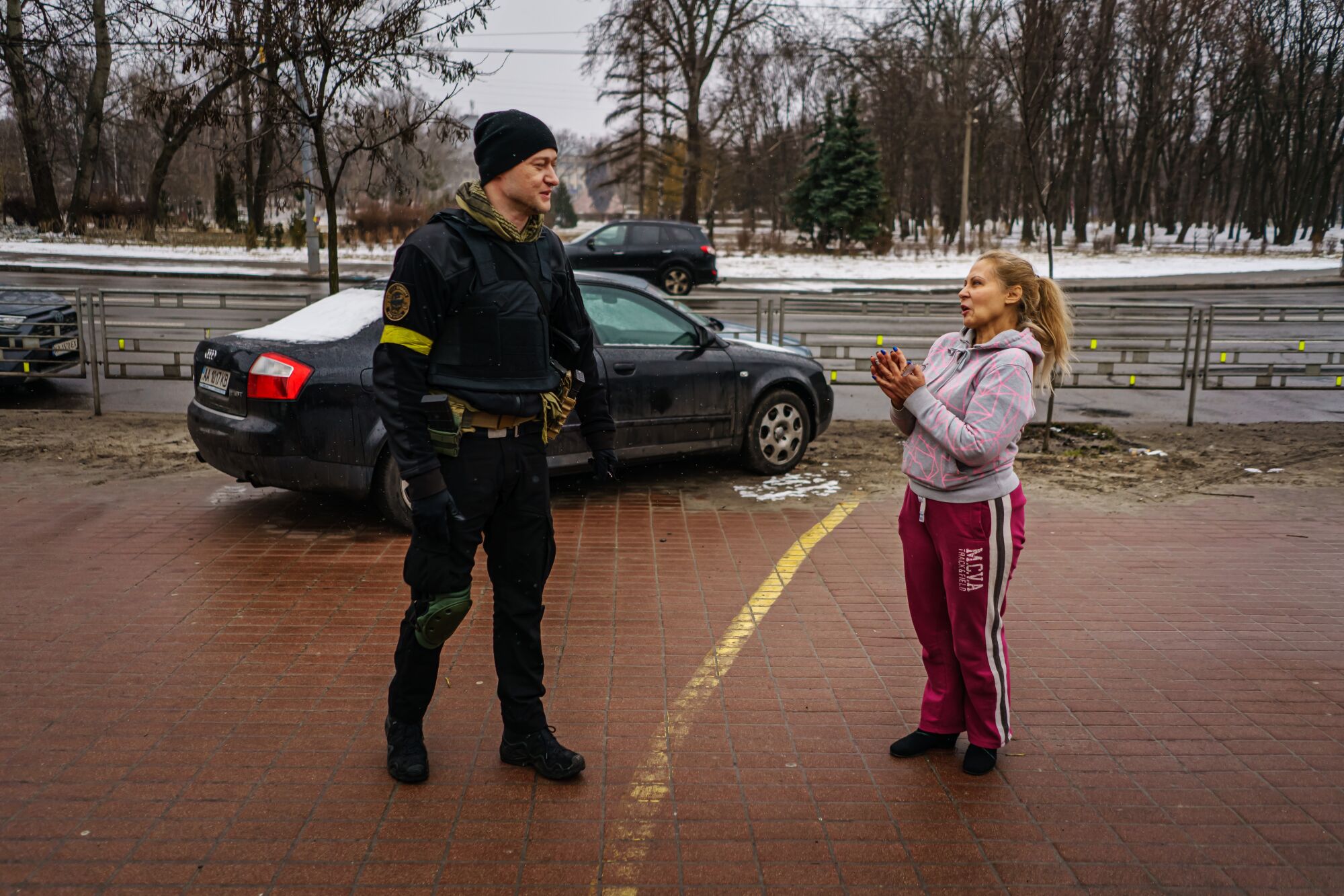 Andriy Khlyvnyuk, a Ukrainian rock star who joined the armed forces, is greeted by a fan in Kyiv
