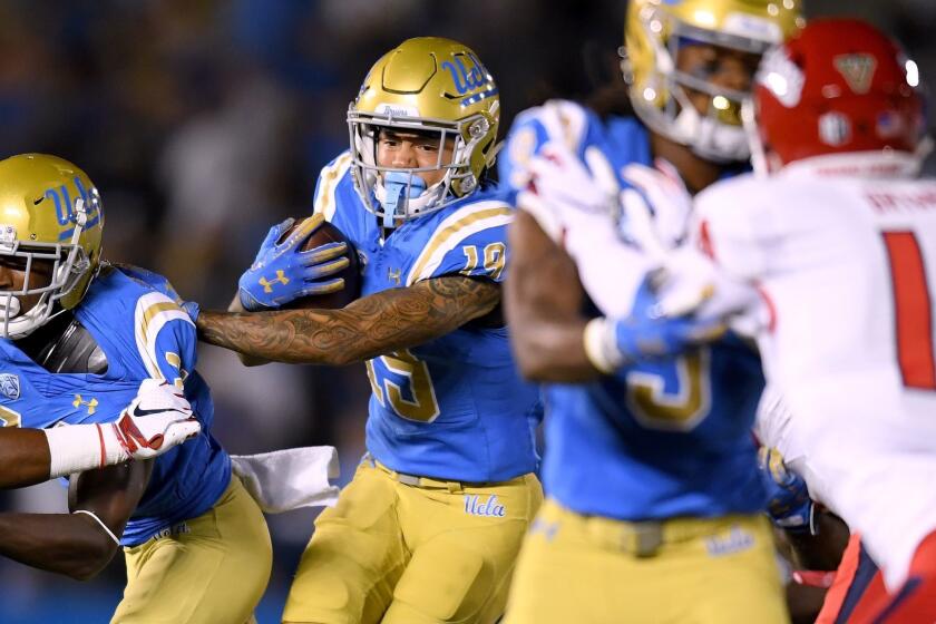 PASADENA, CA - SEPTEMBER 15: Kazmeir Allen #19 of the UCLA Bruins follows a block during the second quarter against the Fresno State Bulldogs at Rose Bowl on September 15, 2018 in Pasadena, California. (Photo by Harry How/Getty Images) ** OUTS - ELSENT, FPG, CM - OUTS * NM, PH, VA if sourced by CT, LA or MoD **