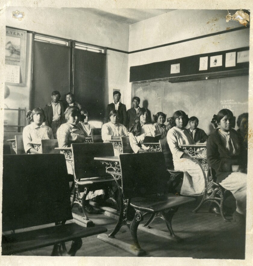 This undated photo courtesy of Stewart Indian School Cultural Center and Museum shows a Stewart Indian School classroom in Carson, Nev. The state of Nevada plans to fully cooperate with federal efforts to investigate the history of Native American boarding schools. On Friday, Dec. 3, 2021, Gov. Steve Sisolak apologized for the state's role in funding the construction of and relocating Native children to the Stewart Indian School in Carson City from 1890 to 1980. As part of a government policy designed to assimilate them into Euro-American culture, children sent to residential schools were forcibly ripped from their homes, prohibited from speaking their languages and buried secretly on school grounds, historians say. The Stewart School is among more than 350 that the Interior Department plans to investigate in a review announced this year. (Courtesy of Stewart Indian School Cultural Center and Museum via AP)
