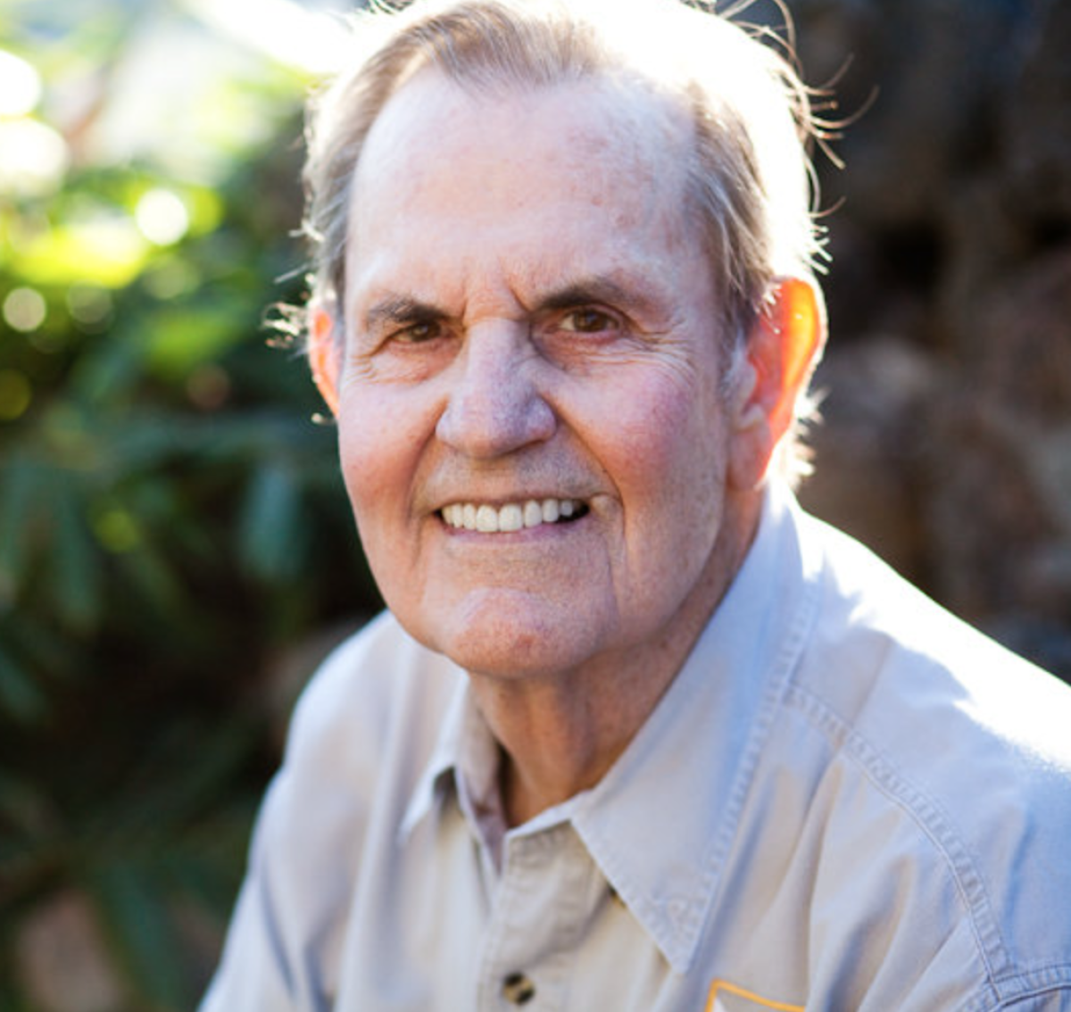 A portrait of a smiling man