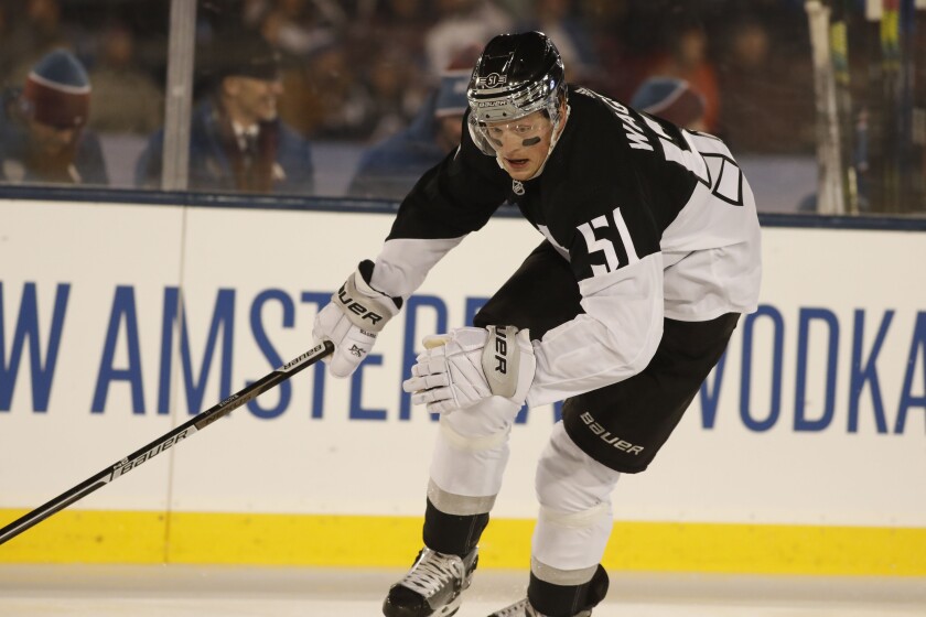 Kings forward Austin Wagner skates toward the puck.
