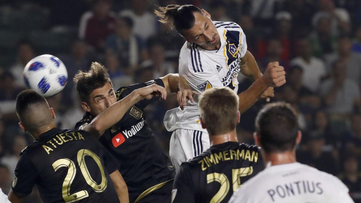Galaxy forward Zlatan Ibrahimovic tries to head the ball into the LAFC goal during a corner kick in the first half Friday on Aug. 24, 2018 in Carson.
