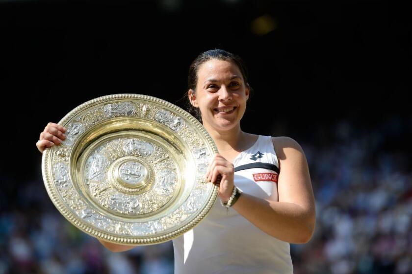 Wimbledon champion Marion Bartoli announced her retirement on Wednesday.