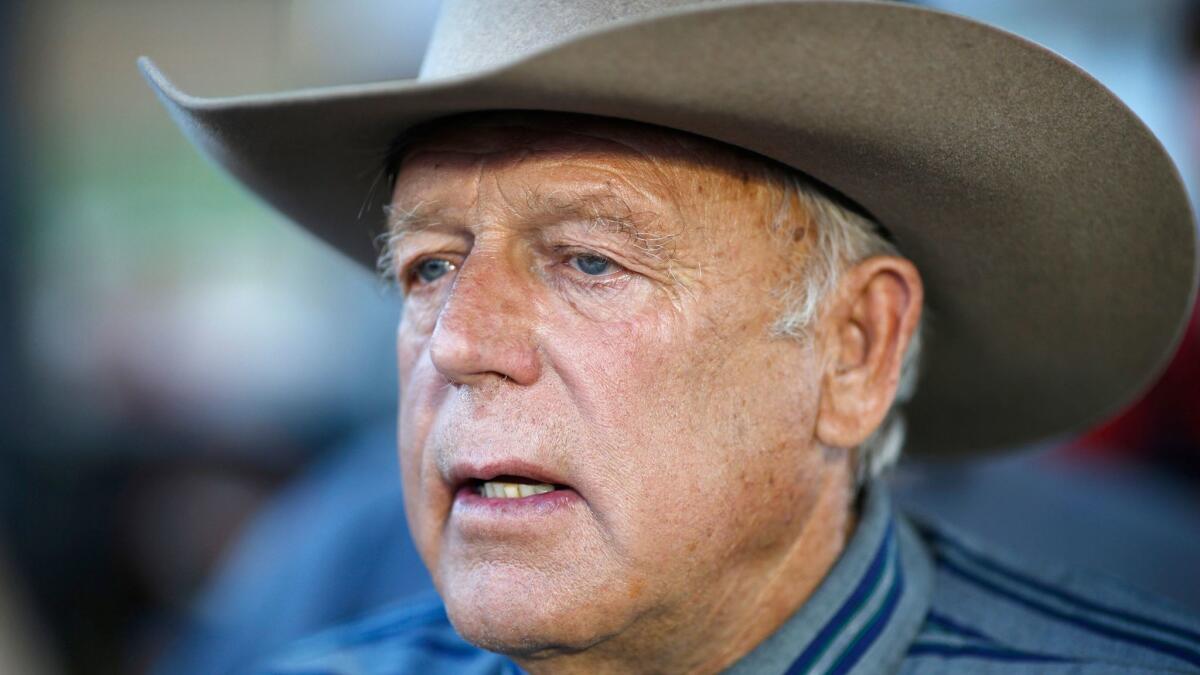 Nevada rancher Cliven Bundy speaks with supporters at an event in Bunkerville, Nev. on April 11, 2015.