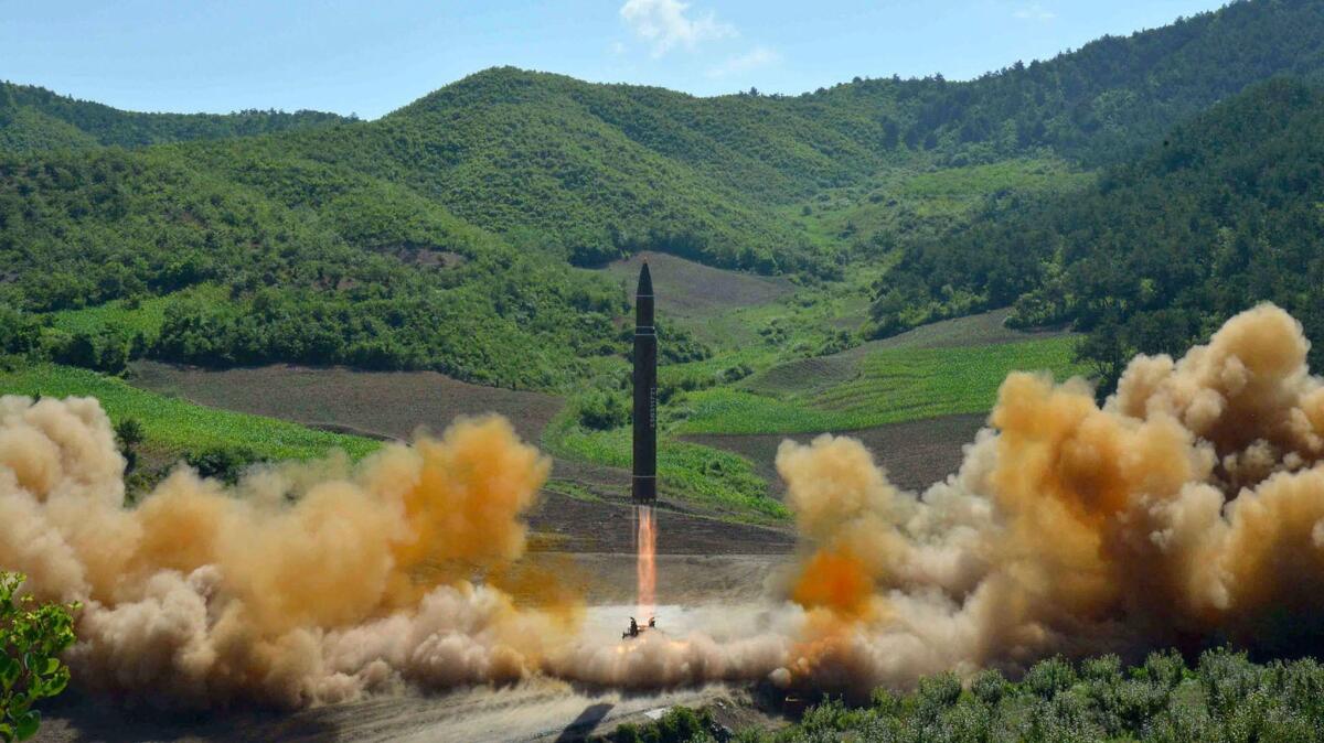 This July 4 photo distributed by the North Korean government shows what was said to be the launch of a Hwasong-14 intercontinental ballistic missile from North Korea. North Korea also fired a ballistic missile on July 28, Japanese officials said.