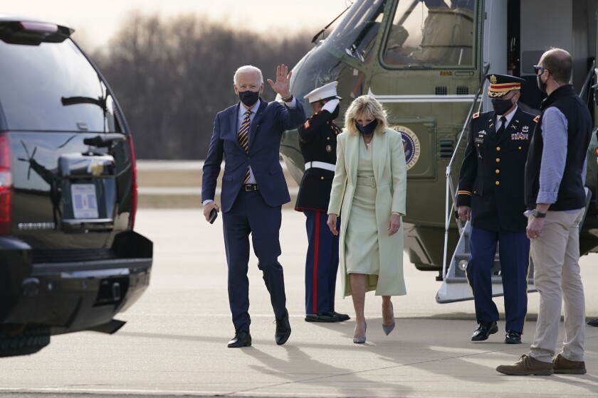 FILE - In this March 12, 2021, file photo President Joe Biden and first lady Jill Biden walk to a motorcade vehicle after stepping off Marine One at Delaware Air National Guard Base in New Castle, Del. The Bidens are spending the weekend at their home in Delaware. (AP Photo/Patrick Semansky, File)