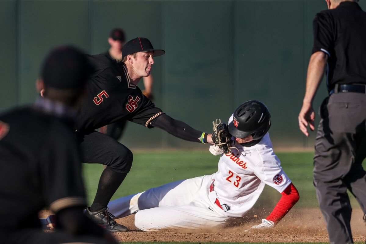 JSerra Catholic shortstop Cody Shrier tags out Harvard Westlake' Will Gasparino.