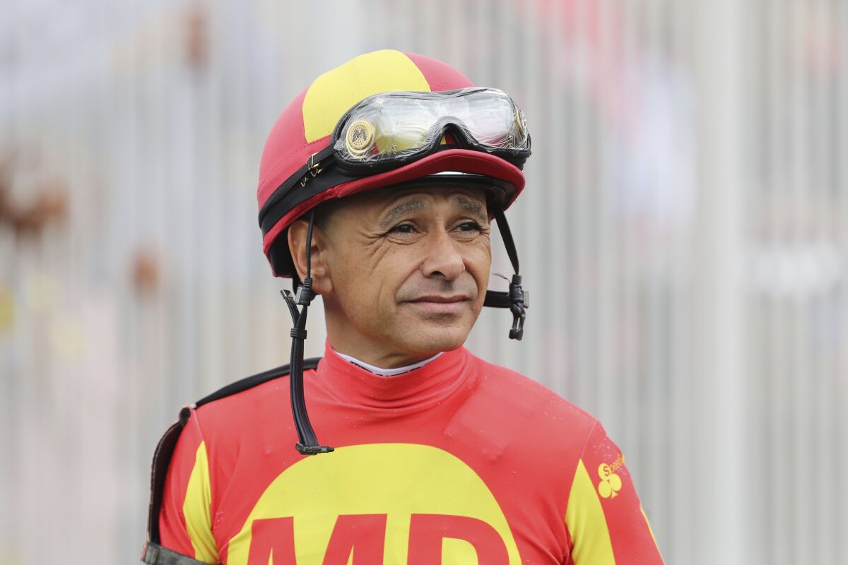 Mike Smith at a 2019 race at Churchill Downs in Kentucky. Due to the pandemic, jockeys had to quarantine before going home.