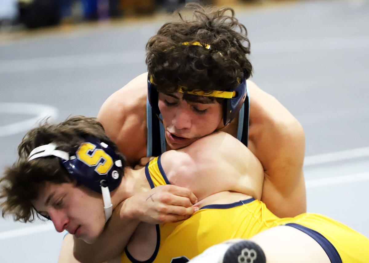 Marina's Shane Lerma against Sonora's AJ Foster in the 152-pound match in the CIF dual meet wrestling championships.