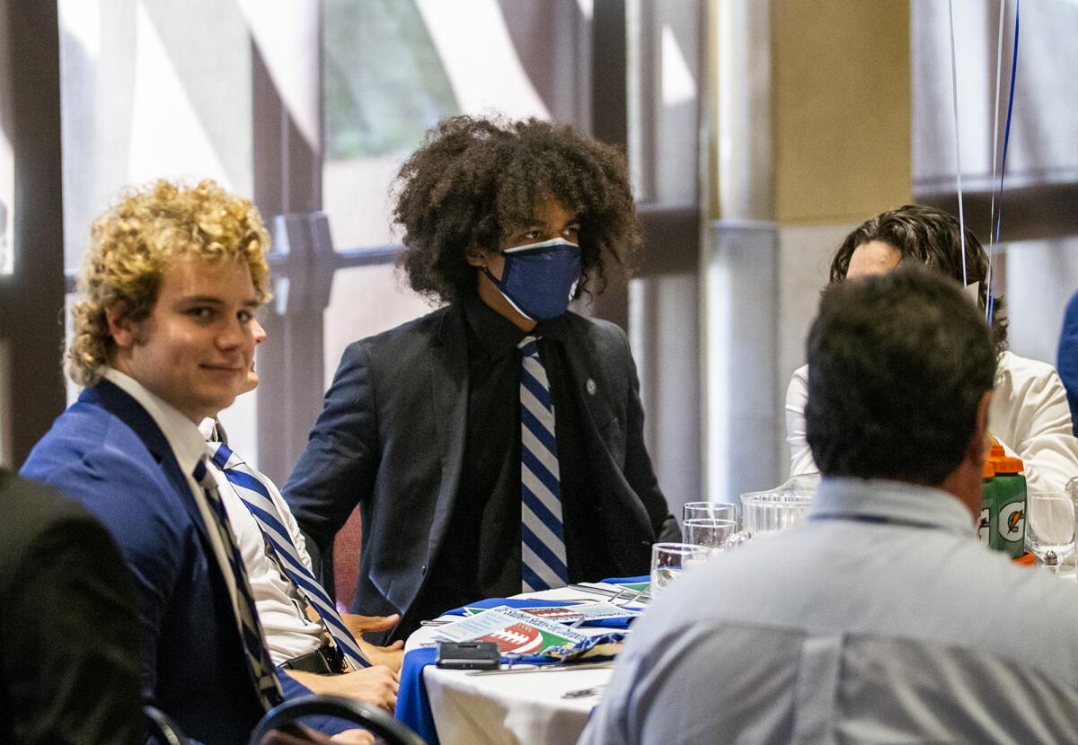 Members of the Newport Harbor High football team attend the 45th annual CIF Southern Section football press luncheon.