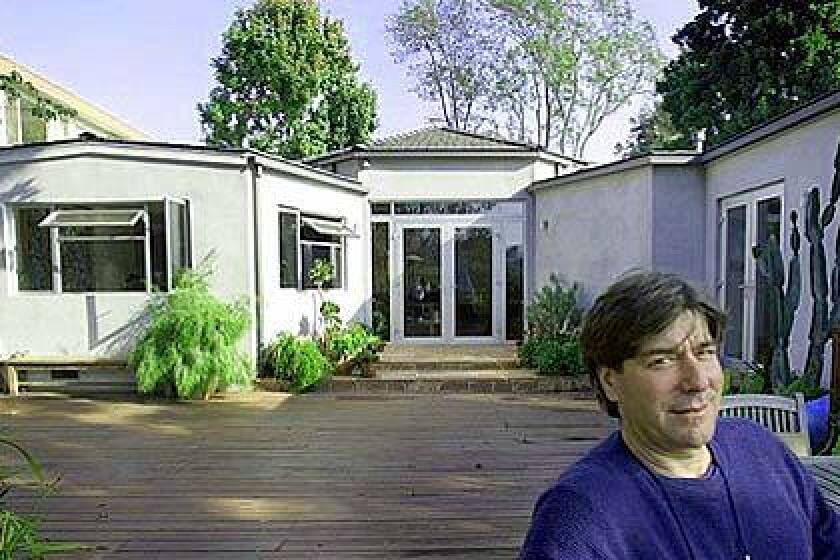 WAITING IT OUT: Eric Broida is interested in buying a nearby house, but doesnt plan on doing so until the asking price drops another $400,000. The price has already been cut several times by the sellers, from the original $4.6 million to $3.6 million. Broida, above, at his Pacific Palisades home. People tell me Im crazy [to think prices will keep falling], but thats what they told me in 1992, he says.