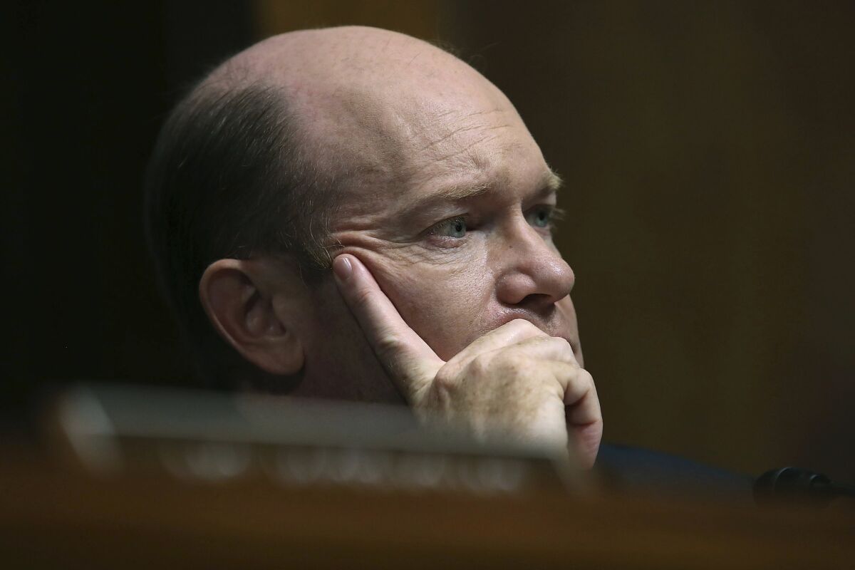Sen. Chris Coons, D-Del., listens to testimony from Christine Blasey Ford.