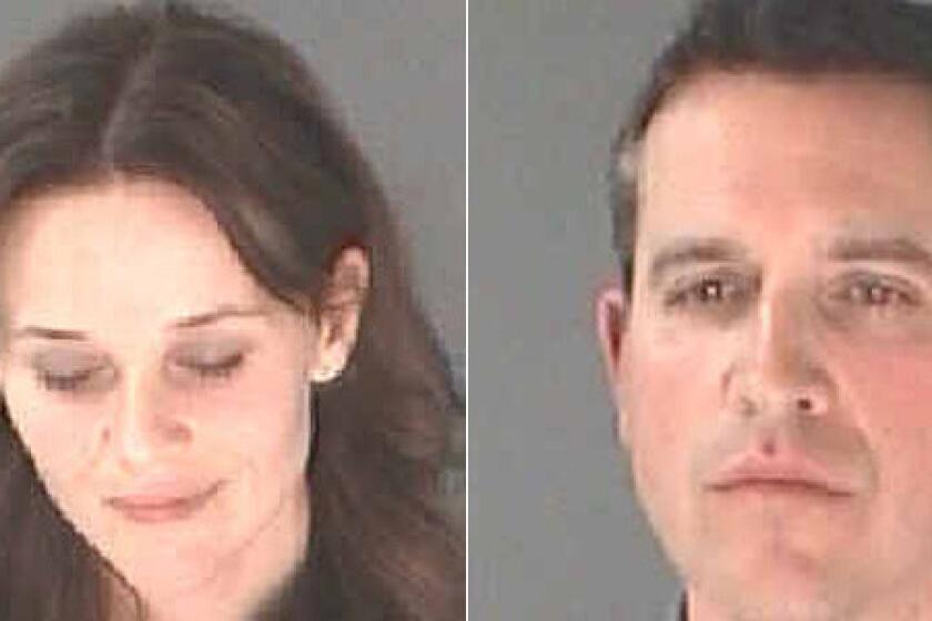Reese Witherspoon, left, and her husband Jim Toth are seen in booking photos taken after being arrested in Atlanta on Friday.