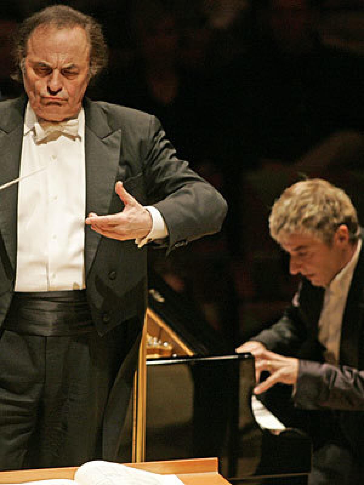 EUROPEAN SENSIBILITY: Charles Dutoit conducts pianist Jean-Yves Thibaudet, right.
