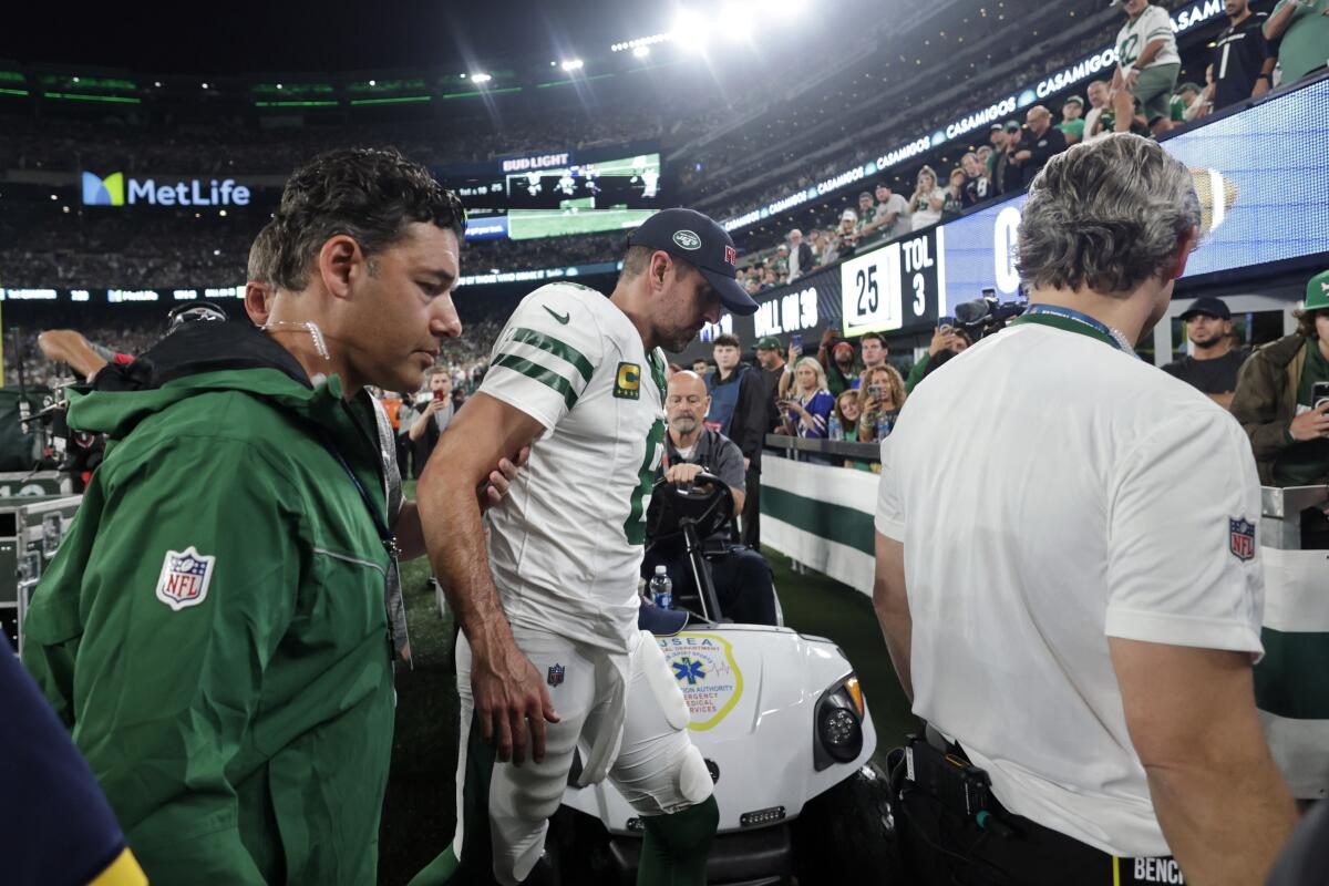 Aaron Rodgers injures his left Achilles tendon in his first series for the  Jets - The San Diego Union-Tribune