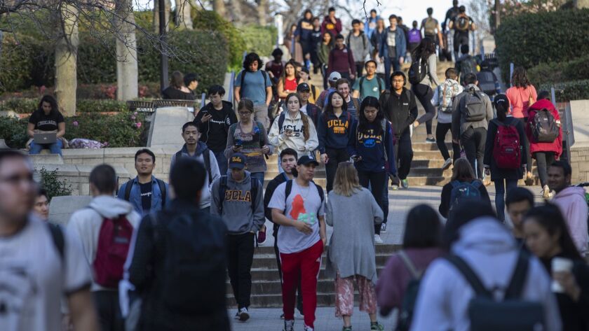 Students walk on the UCLA campus in Los Angeles on Jan. 30.