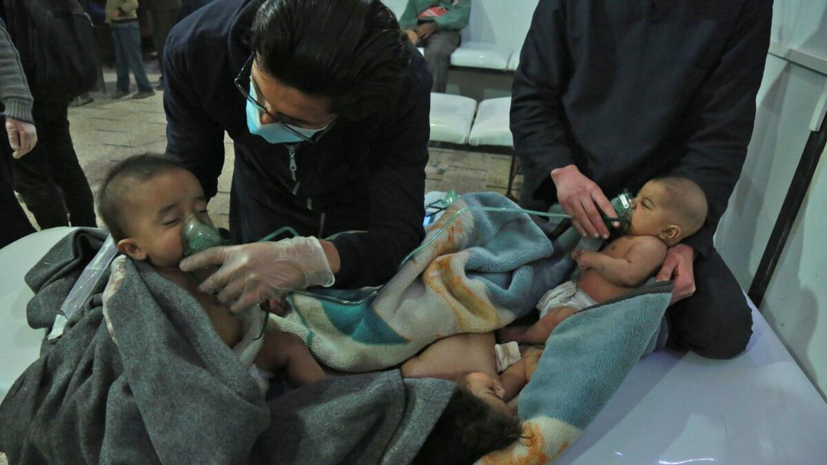 Syrian babies are treated for a suspected chemical attack in the rebel-held village of Shayfoniyeh on the outskirts of Damascus on Feb. 25.