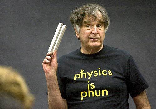 Preston Q. Boomer, science teacher for 50 years at San Lorenzo High School in Felton California, holds a tuning fork as he talks to his physics class about some principles of the transmission of sound.