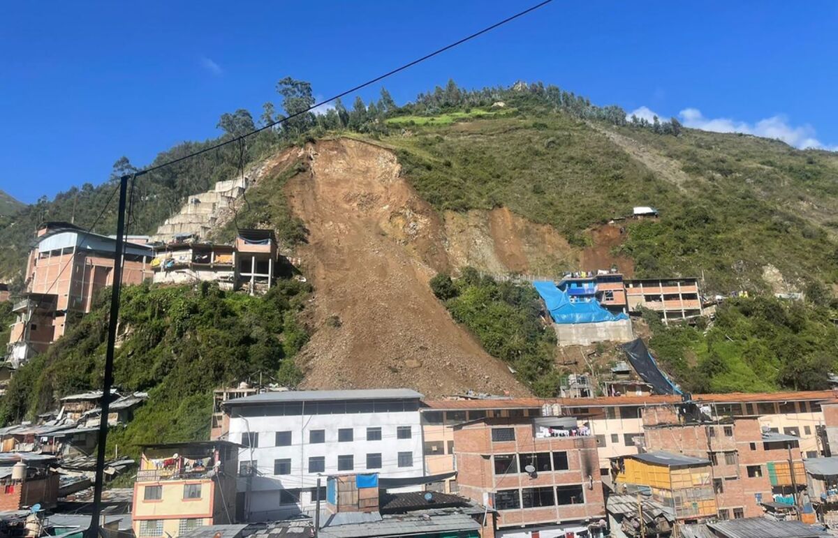 This photo provided by the Parcoy Municipality shows the path of a mudslide in Parcoy, Peru, Tuesday, March 15, 2022. More than 15 homes in the remote town in the Andes of Peru were buried Tuesday after a hillside collapsed due to heavy rains in the area, according to authorities. (Parcoy Municipality via AP)