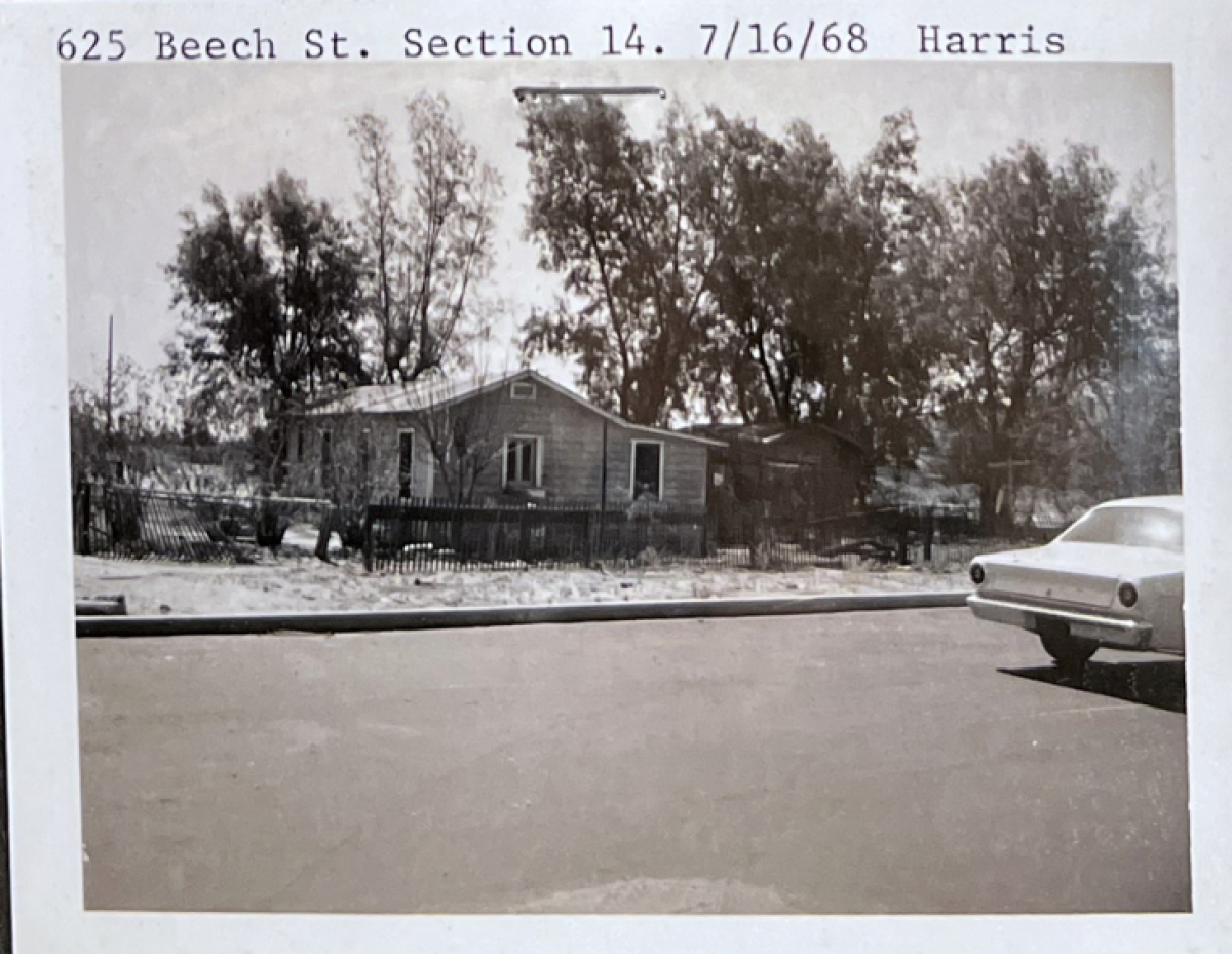 A black-and-white photo of a home framed by trees and a fence, labeled "625 Beech St. Section 14. 7/16/68  Harris."
