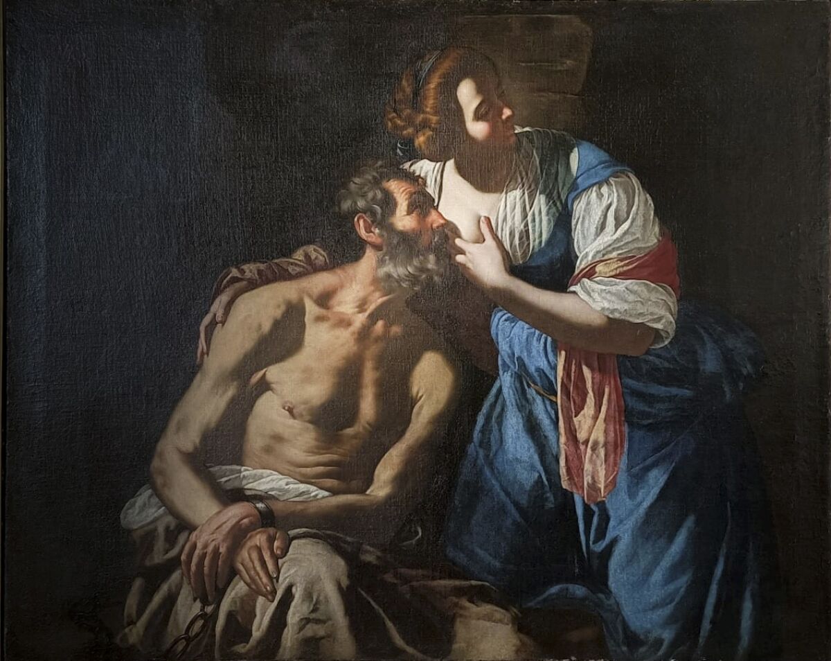 This undated image, provided by the Carabinieri Cultural Heritage Protection Squad in Bari, southern Italy, Tuesday, July 19, 2022, shows 17th Century painter Artemisia Gentileschi's Caritas Romana (Roman Charity). The oil on canvas was illegally exported to Austria in 2019. Italy’s art squad police have thwarted the potential, illegal sale by a Vienna auction house of a 17th-century painting by Artemisia Gentileschi, a celebrated Baroque artist. (Carabinieri Cultural Heritage Protection Squad via AP)