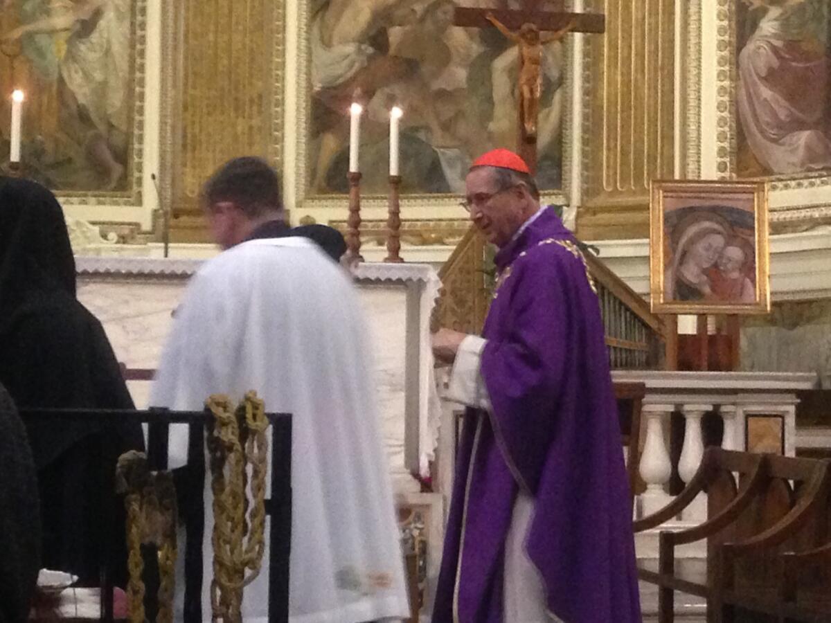 Cardinal Roger Mahony attends a Mass in the Santi Quattro Coronati church in Rome.