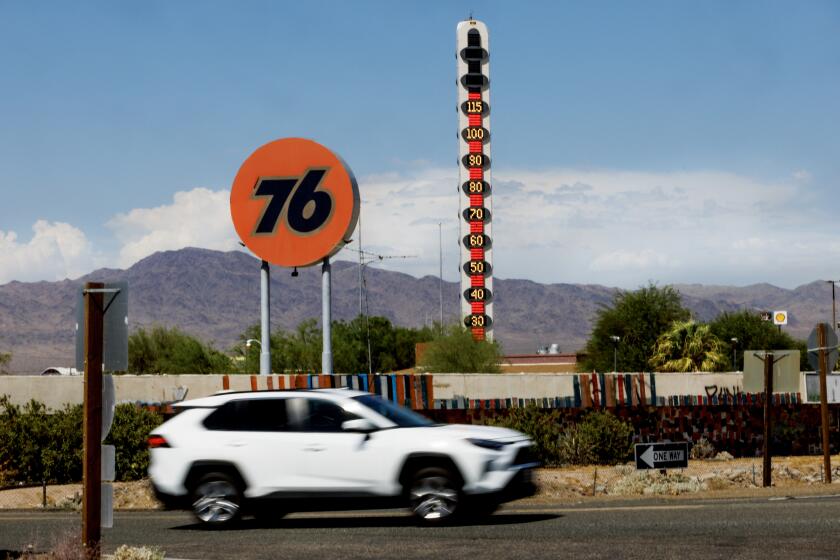 BAKER, CA - JULY 19, 2024: The World's Largest Thermometer reads 115 degrees as the heat wave continues in Southern California on July 19, 2024 in Baker, CA.(Gina Ferazzi / Los Angeles Times)