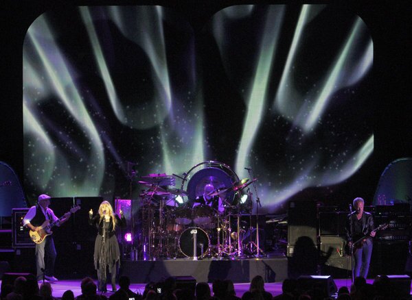 John McVie, left, Stevie Nicks, Mick Fleetwood and Lindsey Buckingham of Fleetwood Mac play the Hollywood Bowl on Saturday, halfway through a three-month North American tour.