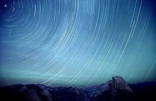 A time exposure of the night sky taken at Yosemites Glacier Point during a gathering of amateur astronomers, many of whom were directly inspired by John Dobson.