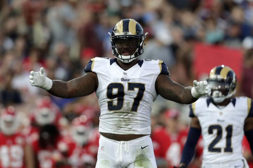 Rams defensive end Eugene Sims gestures during the first half against the Kansas City Chiefs on Aug. 20.