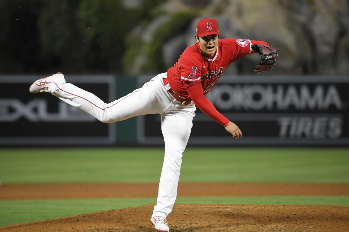 Los Angeles Angels starting pitcher Shohei Ohtani throws to the plate.