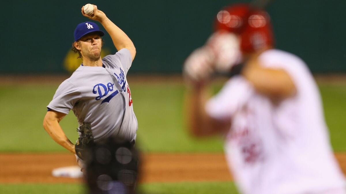 Dodgers starter Clayton Kershaw delivers a pitch during the fourth inning of the team's 4-3 win over the St. Louis Cardinals on Sunday night.