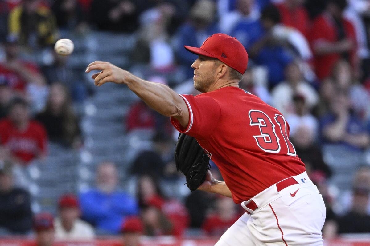 Angels pitcher Tyler Anderson throws to the plate during the first inning of a spring-training game against the Dodgers.