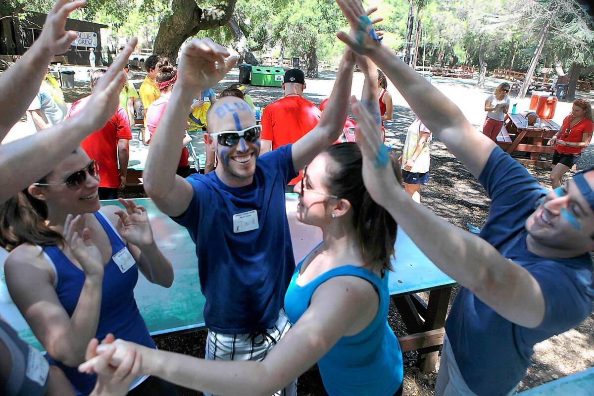 Blue team members celebrate a win in Color Wars at Camp JCA Shalom in Malibu.