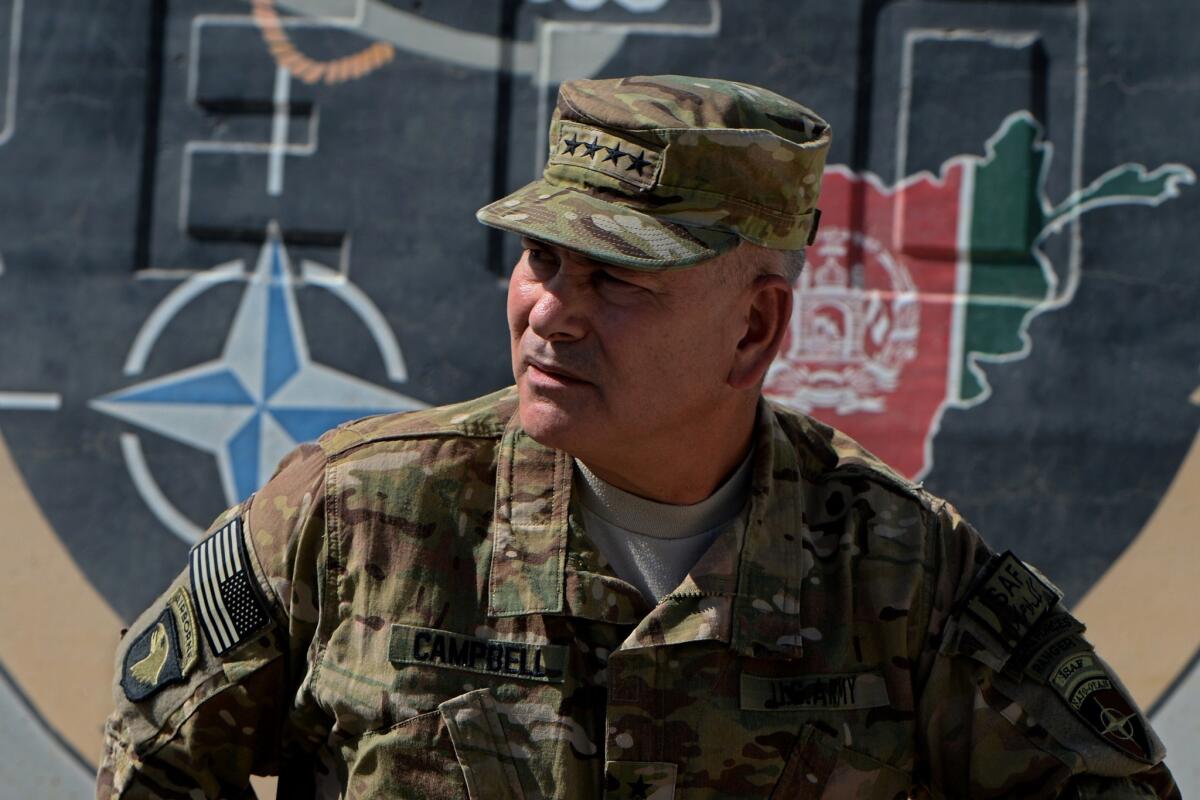 Gen. John Campbell attends a handover ceremony before the British and U.S. military withdrawal from the Camp Bastion-Leatherneck complex at Lashkar Gah in Helmand province, Afghanistan, in October 2014.