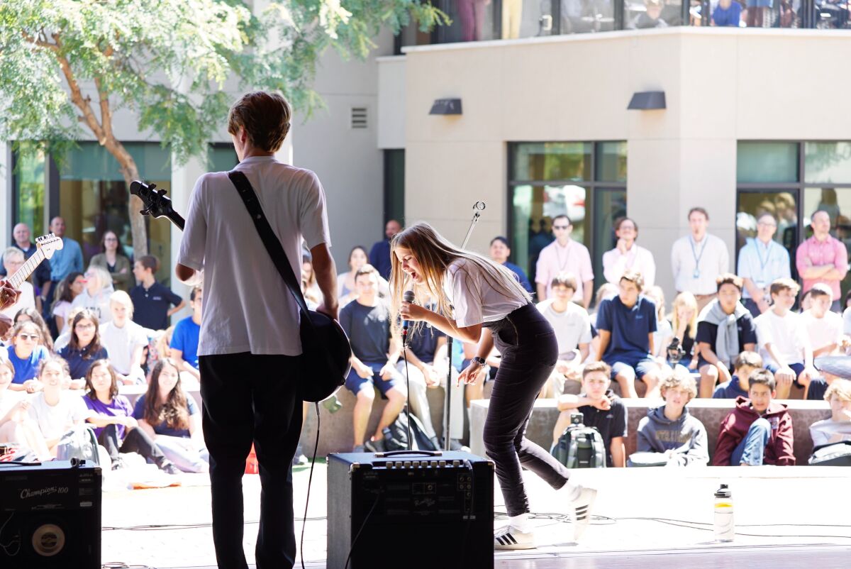Ella Shreiner plays with her band Raintree Drive on campus at Pacific Ridge during Community Life.