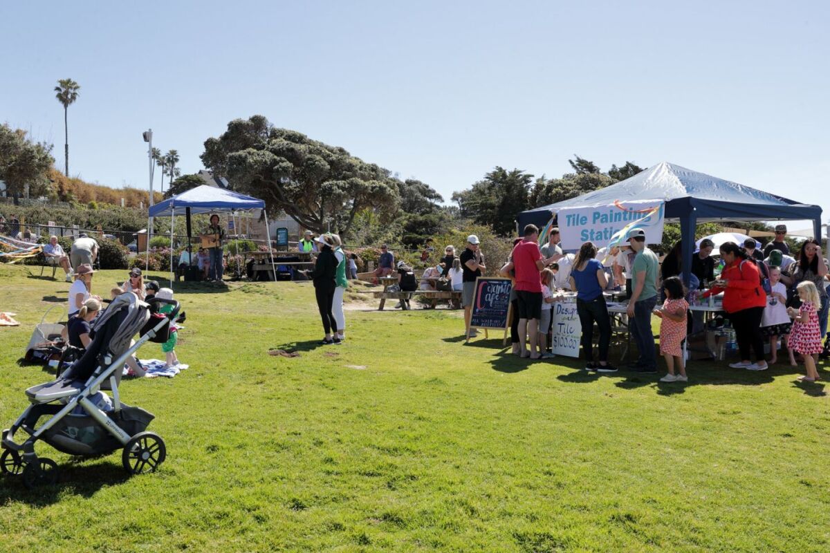 A family day of fun, crafts and entertainment held at a Del Mar Tot Lot fundraiser last spring.