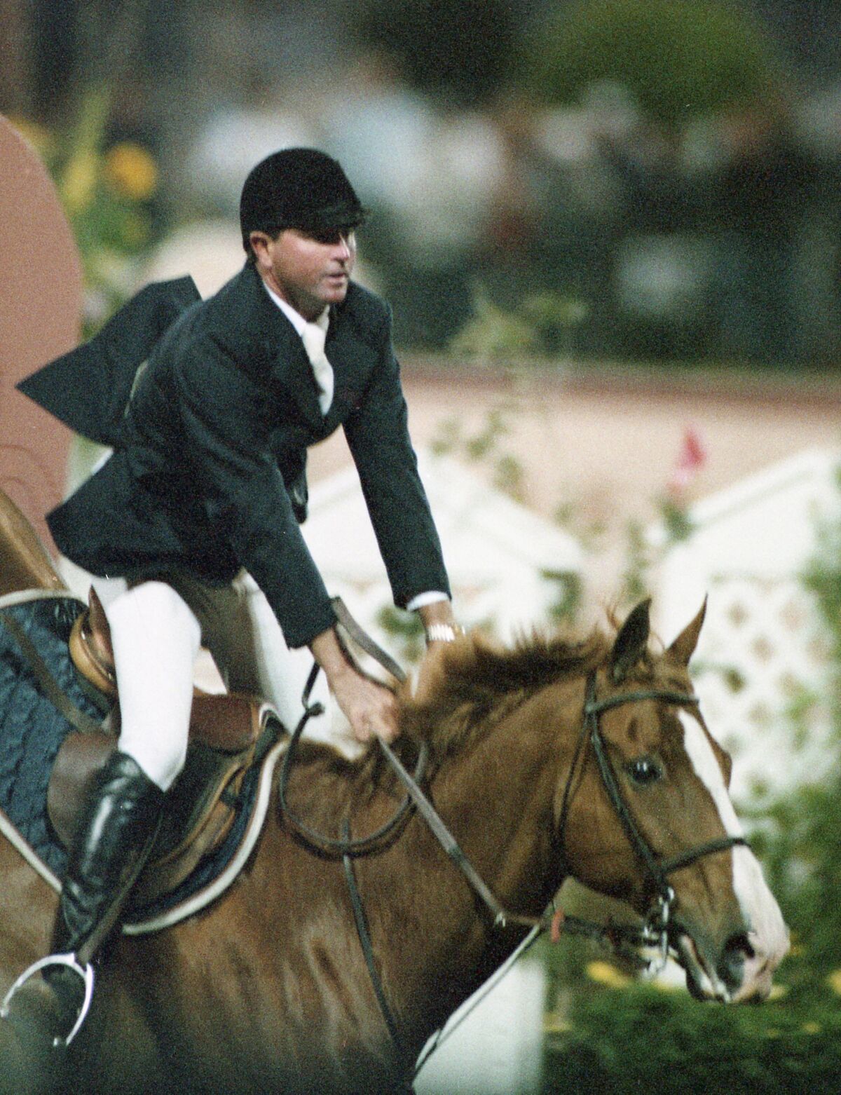 Rob Gage, riding Last Laugh in the $30,000 Grand Prix of Del Mar at the Del Mar National Horse Show on May 7, 1994. (James Skovmand / The San Diego Union-Tribune) User Upload Caption: U-T file photos of equestrian Rob Gage (Robert Gage) at Del Mar, May 7, 1994 assignment.